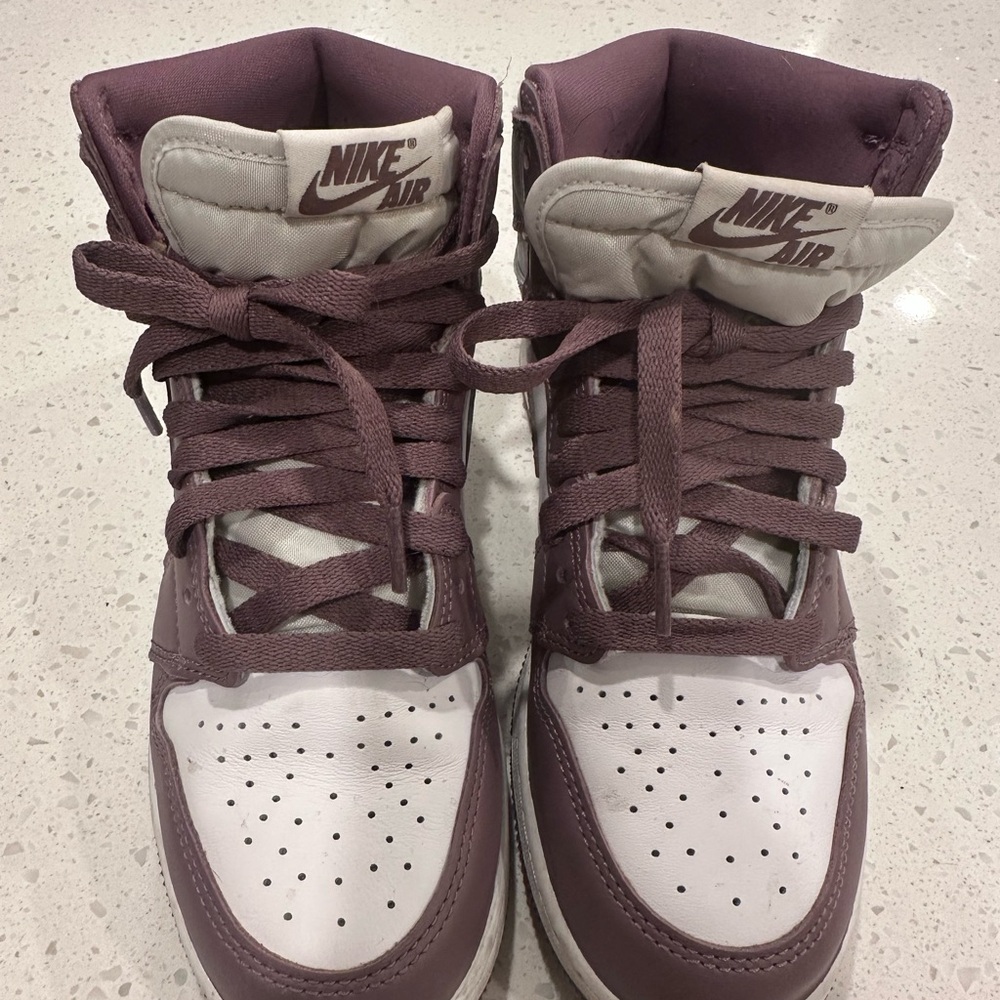 Jordan’s Nike High-Top Sneakers in lavender and White